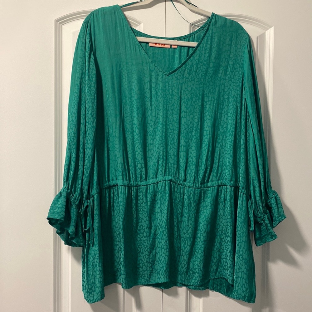 Emerald Green silk womens blouse with stylish sleeves and waistline.